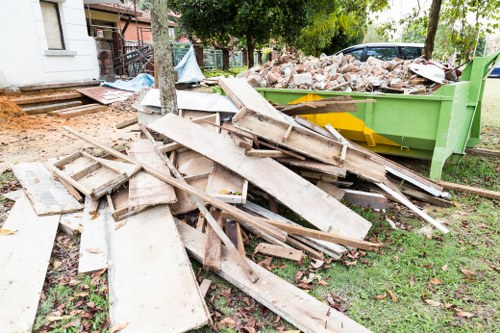 Professional team conducting loft clearance in a Penge home